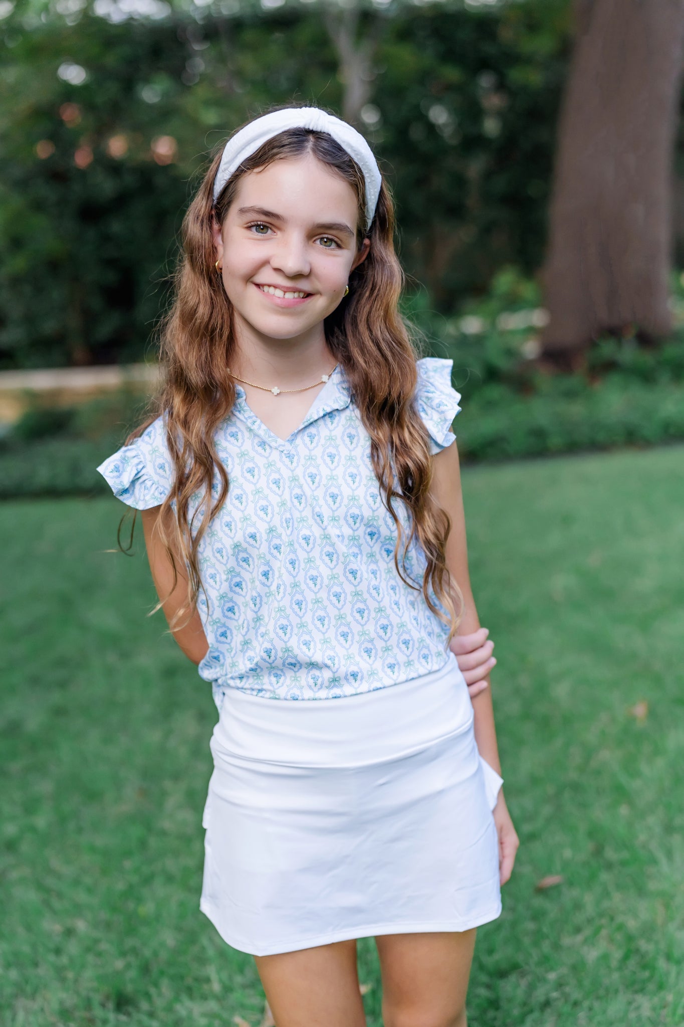 Top deportivo sin mangas Ellie para niña de LH Sport - Hampton Blooms